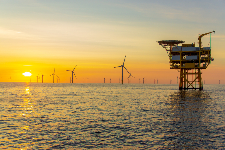 Sunset at Offshore Wind Farm